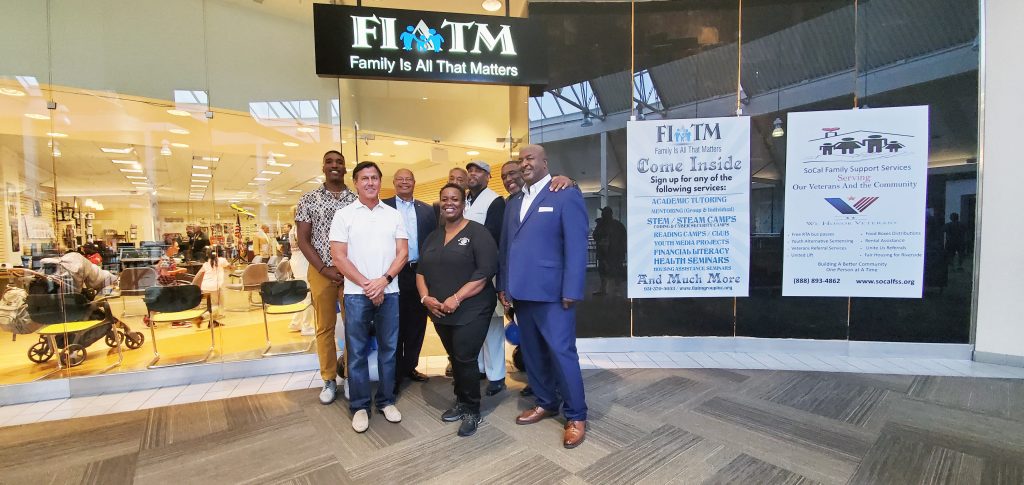 FIATM Grand Opening at the Galleria at Tyler in front of the second story entrance right in front of the old Nordstrom’s department store.  Left to right, front row, David Thurman, Executive Board Member, Monica Hunter, Executive Vice Chair, President of Advisory Board, Yundra Thomas .  Back Row: Donnell P. Layne, CIO and Executive Board Member, Carl M. Dameron, president of Dameron Communications FIATM’s public relations agency, Wayne Brown, Executive Board Member Kuba Brown, CEO, and David, Jordan Layne, COO.