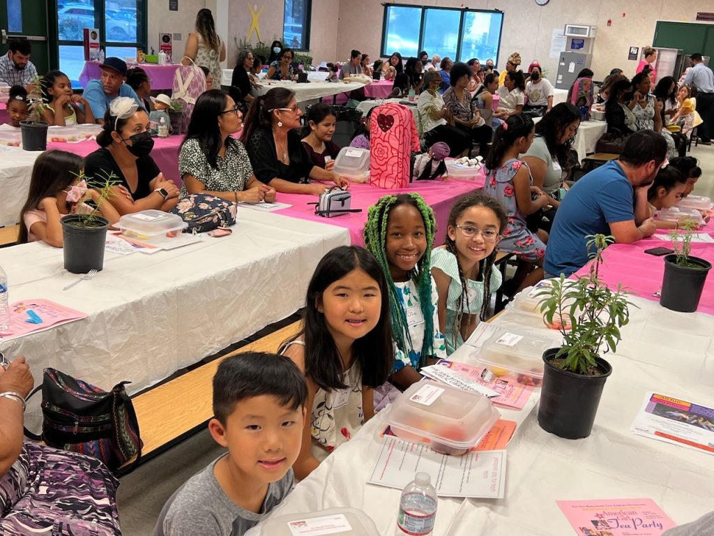 Photo Caption: Girls and Boys of all ethnicities attended the recent American Girl Tea Party. The Girl Scouts enough interest to start a new Troop in the Mt. Vernon area," says Knea Hawley, Vice President of Development for Girls Scouts of San Gorgonio The American Girl Doll Tea Party is made possible thanks to the generous support of the people and organizations of San Bernardino including the San Bernardino City Library Foundation.