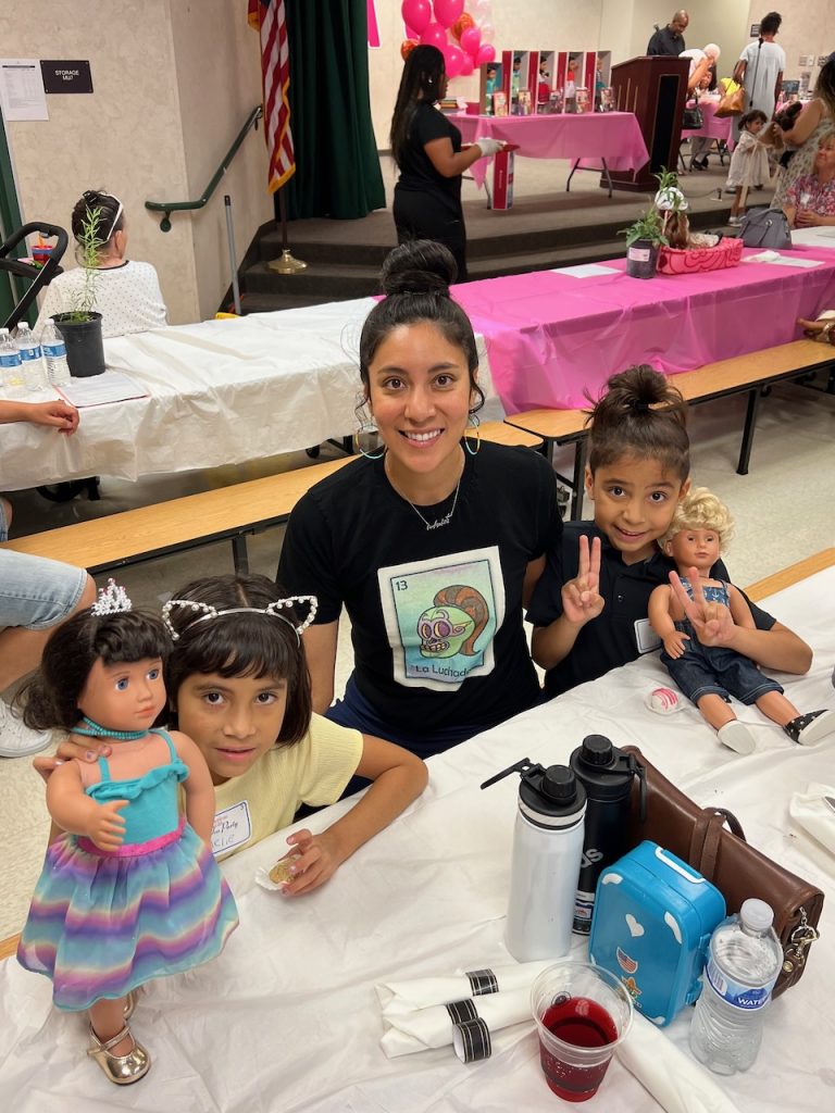 Photo caption: Amelie and Noé both brought their dolls and mom Ruth Soto was happy to bring them. “We are having so much fun. Thank you for having this,” said Ruth.