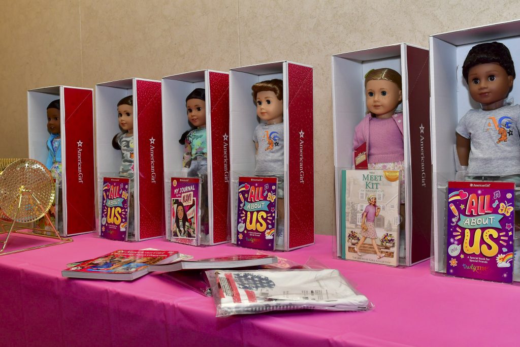 American Girl dolls and books were raffled off to children who attended the tea party. Photo by Chris Sloan