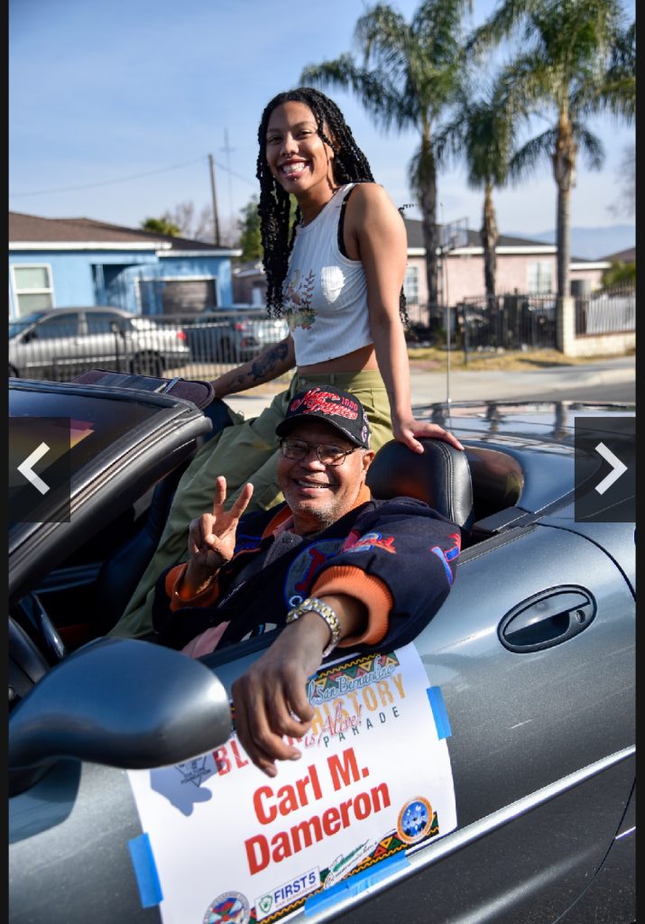 Black Culture Foundation president Carl M. Dameron and his daughter Shaila Carly. 